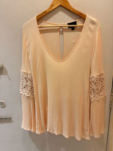 Elegant Peach Top with Lace Detail