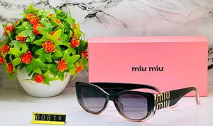 Miu Mi Black Cat-Eye Sunglasses