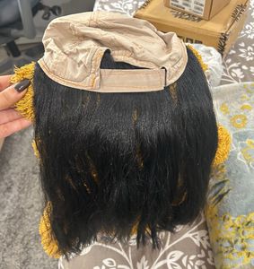 Cap with hair attached