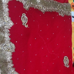 Shiffon bright red partywear saree, golden stone