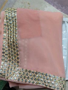 Elegant Peach Saree with Embellished Border
