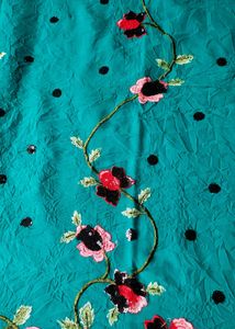 Elegant Teal Saree with Floral Embroidery