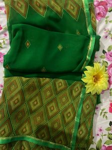 Elegant Green Saree with Geometric Pattern