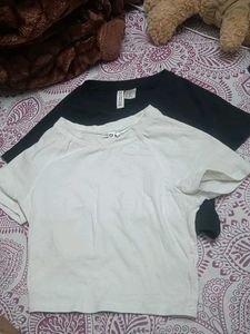 one H&M T-Shirt  - Black or White
