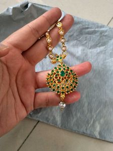 Stunning Gold Necklace with Green Stones