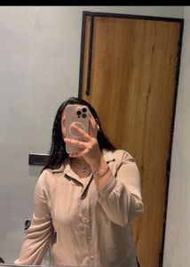 beige yellow shirt and heels