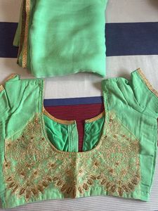Elegant Mint Green Saree with Gold Embroidery