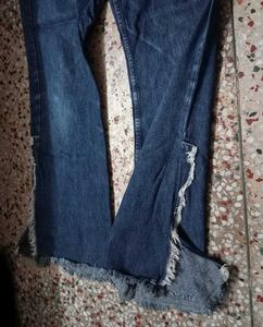 Flared Denim Jeans with Frayed Hem