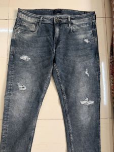 Distressed Denim Jeans