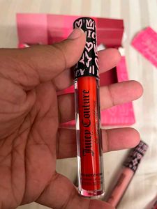 Juicy Couture plumping Lip Gloss