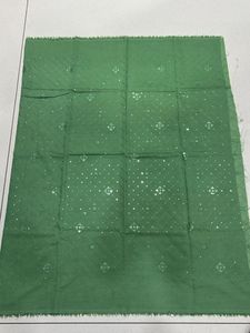 Elegant Green Dress Material with Embellishments