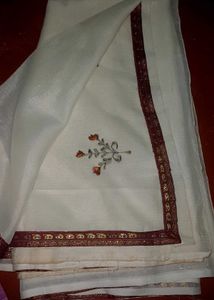 Elegant Cream Saree with Floral Border