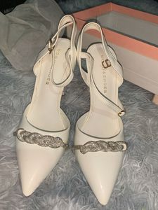 Elegant White Heels with Rhinestone Detail