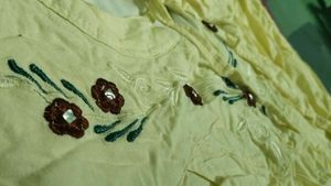Embroidered light yellow top