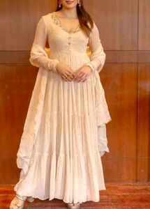 Elegant Tiered Gown with Embellishments