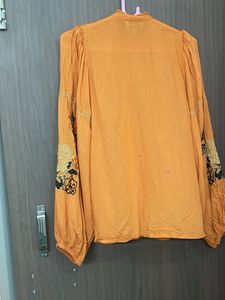 Orange Embroidered designer top