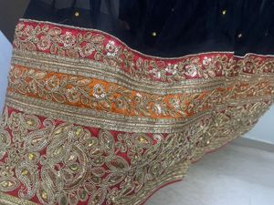 Embellished Black Lehenga Choli with Red Dupatta