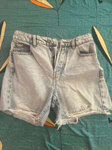 light washed distressed denim shorts