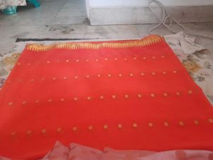 Vibrant Orange Saree with Golden