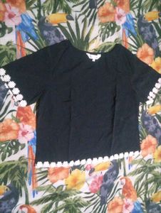 Chic Black Top with White Lace Trim