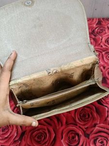 Gold sling bag