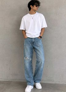 Distressed Blue Denim Jeans
