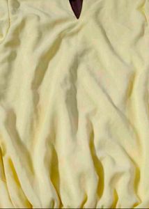 New not used cute yellow ruffle sleeve top