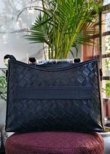 Elegant Black Woven Handbag