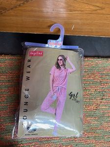 Its a Co-ord Set With Pink & White Design