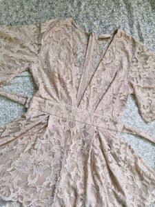Elegant Lace Romper with Bell Sleeves