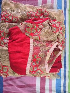 Embroidered Red and Gold Lehenga Choli