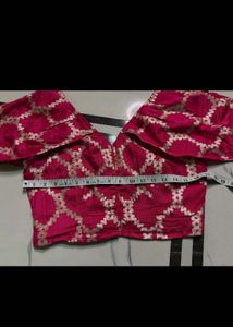 Designer Pink Blouse with Gold Print and necklace