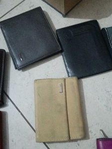 Assorted Wallets - Various Styles ( one piece 300)