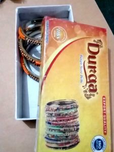 Set of Orange &amp; Silver Bangles