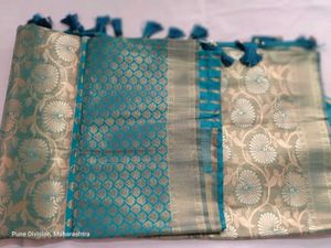 Elegant Teal and Gold Brocade Saree