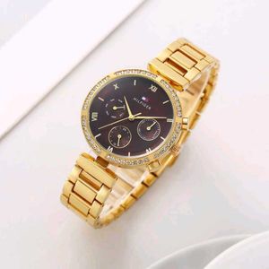 Elegant Gold Tommy Hilfiger Watch