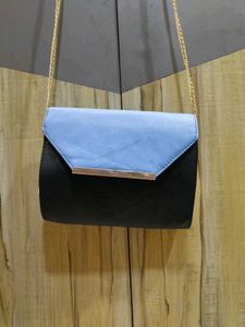 Chic Two-Tone Clutch with Gold Chain
