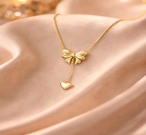 Gold Bow &amp; Heart Necklace