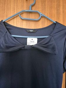 Elegant Navy Blue Dress with Bow Detail