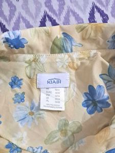 Floral shirt with black n white striped shir