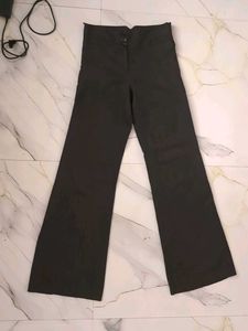 flared brown trousers/ pants