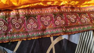 Exquisite Orange Saree Intricate Embellishmen