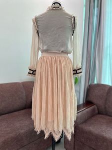 Elegant Pleated Midi Skirt with Lace Trim