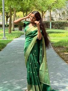Elegant Green Saree with Gold Border