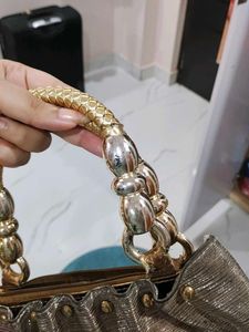 Elegant Silver Embellished Clutch