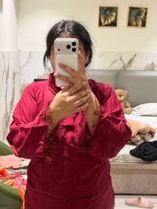 maroon kurta.