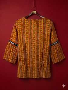 Short yellow kurta for everyday wear