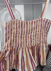 Smocked Striped Peplum Top