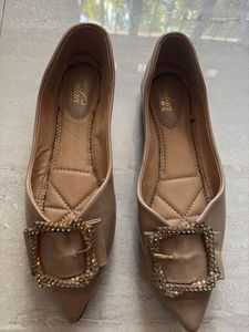 Elegant Nude Pointed Flats with Embellished Buckle