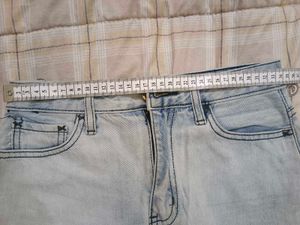 Light Wash Ripped Denim Mini Skirt